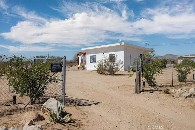 2250 Delgada Ave, Landers, CA 92285 - view of front of house featuring a gate