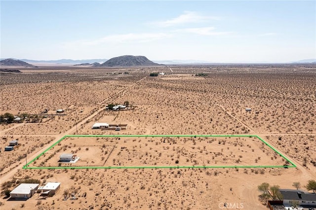 2250 Delgada Ave, Landers, CA 92285 - aerial view of sparsely populated area with a mountainous background and property boundaries highlighted