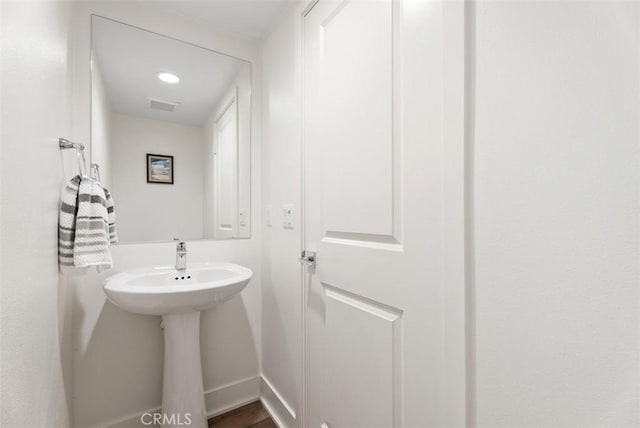 12178 Greenleaf Ln, Garden Grove, CA 92840 - bathroom featuring baseboards and a sink