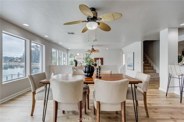 42768 Santa Suzanne Pl, Temecula, CA 92592 - dining area featuring light wood finished floors, a ceiling fan, stairs, and recessed lighting