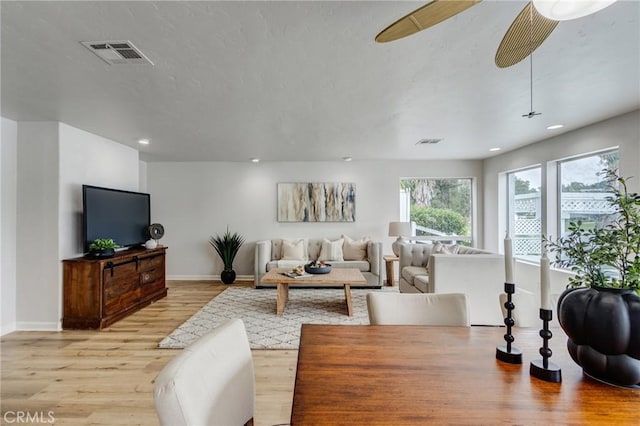 42768 Santa Suzanne Pl, Temecula, CA 92592 - living room featuring light wood finished floors, recessed lighting, and a ceiling fan