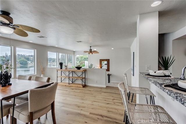 42768 Santa Suzanne Pl, Temecula, CA 92592 - dining area featuring a ceiling fan, light wood-style flooring, and recessed lighting