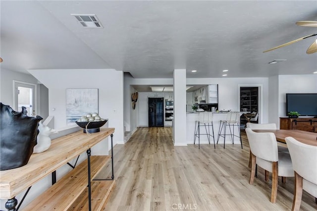 42768 Santa Suzanne Pl, Temecula, CA 92592 - living area featuring light wood-type flooring and ceiling fan