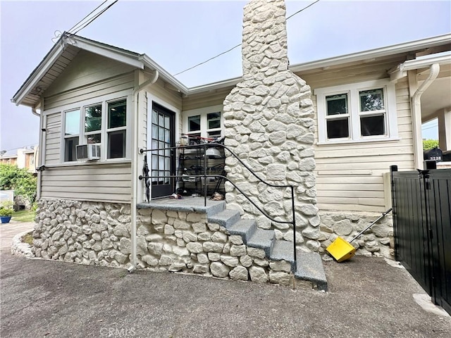 3238 Prospect Ave, La Crescenta, CA 91214 - view of side of property featuring cooling unit and a chimney