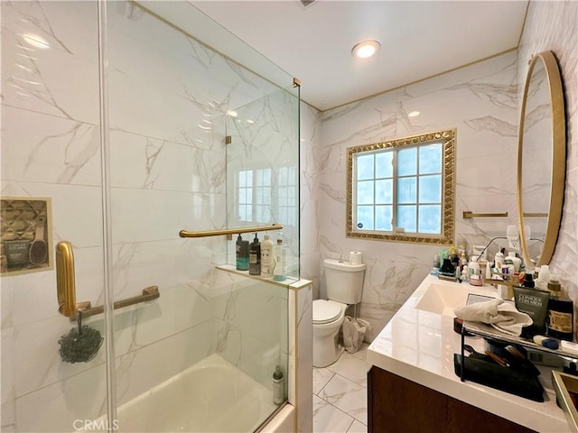 3238 Prospect Ave, La Crescenta, CA 91214 - full bathroom featuring vanity, marble finish flooring, and bath / shower combo with glass door