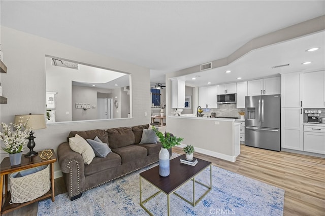 1519 San Rafael Pl, Corona, CA 92882 - living area featuring light wood-style floors, recessed lighting, and a ceiling fan
