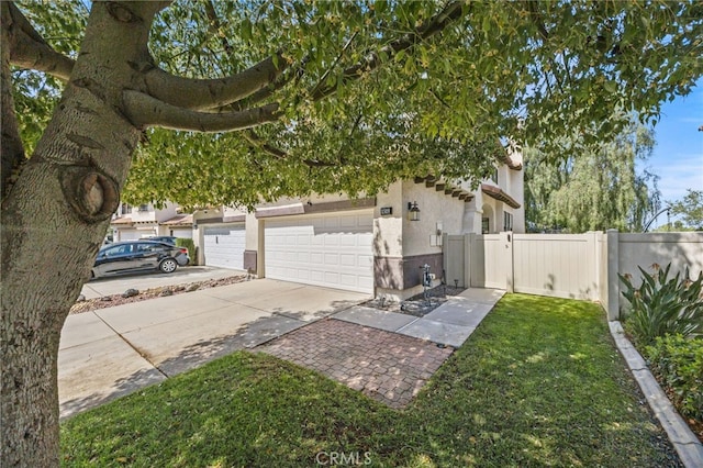 1519 San Rafael Pl, Corona, CA 92882 - view of home's exterior with concrete driveway, stucco siding, and a gate