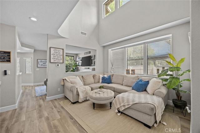 1519 San Rafael Pl, Corona, CA 92882 - living room with light wood-style flooring and recessed lighting