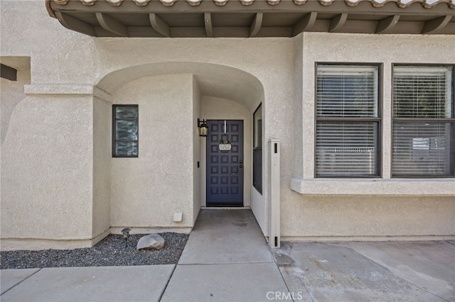 1519 San Rafael Pl, Corona, CA 92882 - doorway to property featuring stucco siding and a tiled roof