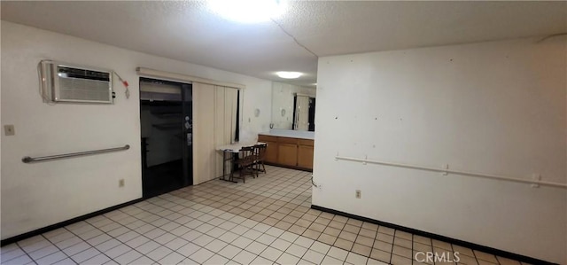 14805 Chase St Unit 105, Panorama City, CA 91402 - empty room with a wall mounted air conditioner