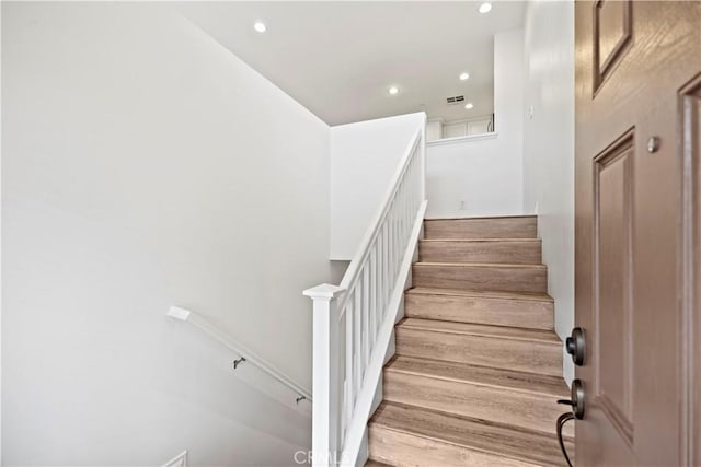 80 Hedge Bloom, Irvine, CA 92618 - stairway with recessed lighting and wood finished floors