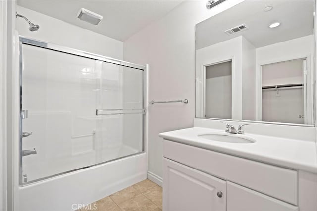 80 Hedge Bloom, Irvine, CA 92618 - bathroom featuring vanity, shower / bath combination with glass door, and tile patterned floors