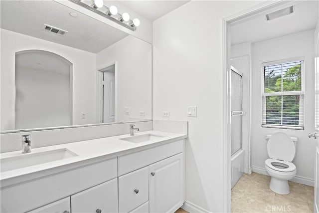 80 Hedge Bloom, Irvine, CA 92618 - bathroom with double vanity, combined bath / shower with glass door, and tile patterned floors