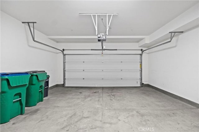 80 Hedge Bloom, Irvine, CA 92618 - garage with a garage door opener and baseboards