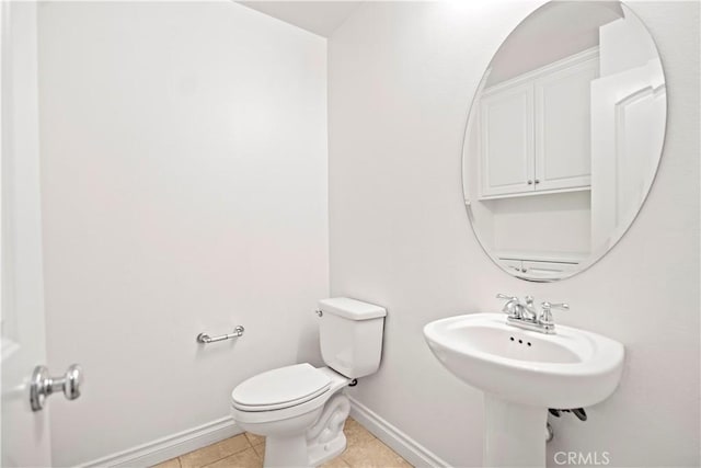 80 Hedge Bloom, Irvine, CA 92618 - half bath featuring baseboards and tile patterned flooring