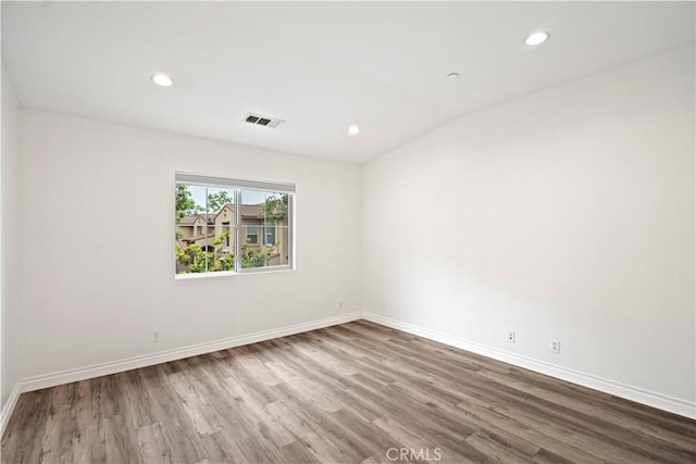 80 Hedge Bloom, Irvine, CA 92618 - empty room with wood finished floors and recessed lighting