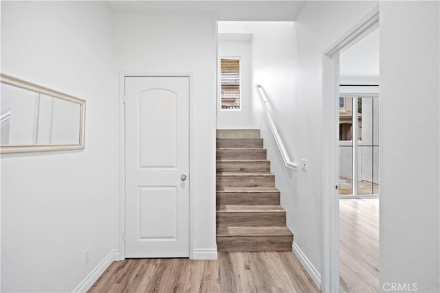 80 Hedge Bloom, Irvine, CA 92618 - staircase featuring wood finished floors and baseboards