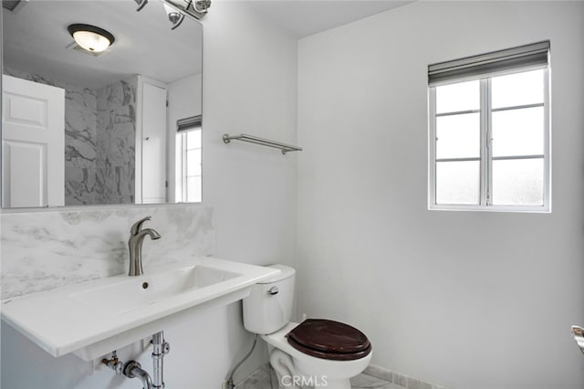 17450 Devonshire St, Northridge, CA 91325 - bathroom with toilet and baseboards