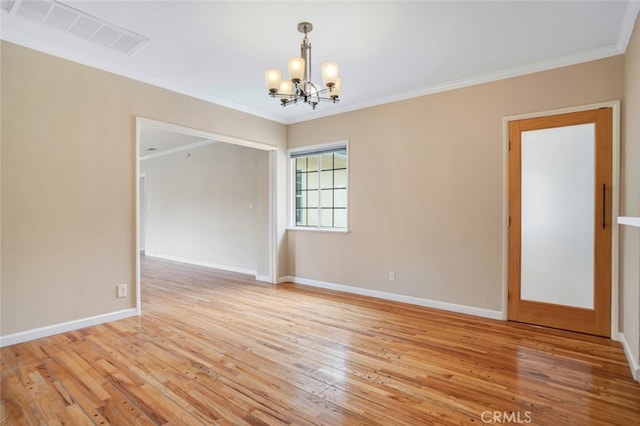 17450 Devonshire St, Northridge, CA 91325 - spare room featuring a chandelier, light wood-style floors, and ornamental molding