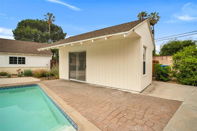 17450 Devonshire St, Northridge, CA 91325 - rear view of house featuring a patio area and a shingled roof