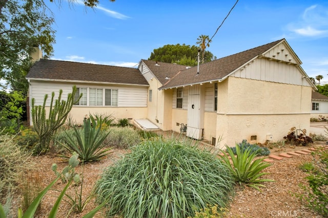 17450 Devonshire St, Northridge, CA 91325 - ranch-style house with a shingled roof and stucco siding