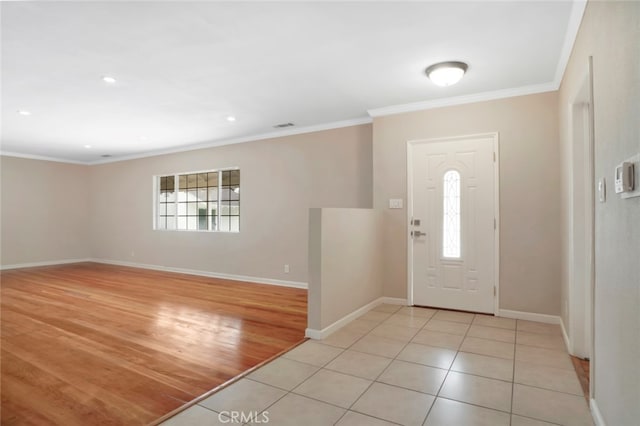 17450 Devonshire St, Northridge, CA 91325 - foyer entrance with crown molding, light tile patterned floors, and recessed lighting