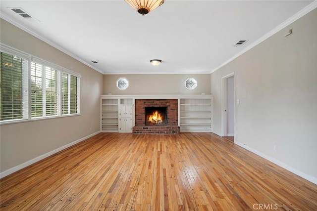 17450 Devonshire St, Northridge, CA 91325 - unfurnished living room with light wood-style floors, crown molding, and a brick fireplace