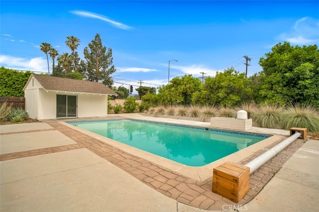 17450 Devonshire St, Northridge, CA 91325 - view of pool with an outbuilding, a patio area, and an exterior structure