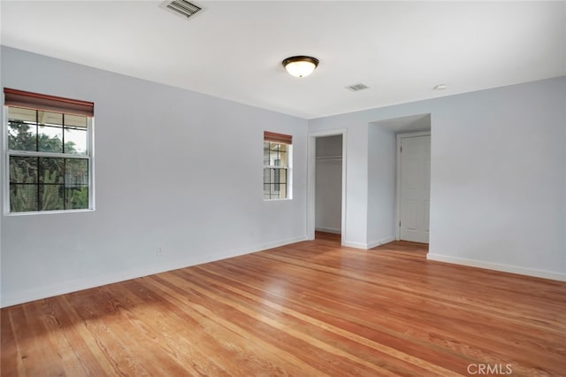 17450 Devonshire St, Northridge, CA 91325 - unfurnished room featuring light wood finished floors and baseboards