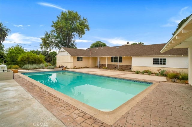 17450 Devonshire St, Northridge, CA 91325 - swimming pool featuring a patio area