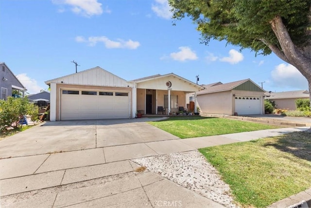 12727 Lefloss Ave, Norwalk, CA 90650 - single story home with a front lawn, a garage, concrete driveway, and stucco siding