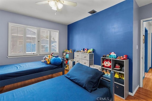 12727 Lefloss Ave, Norwalk, CA 90650 - bedroom with wood finished floors and a ceiling fan