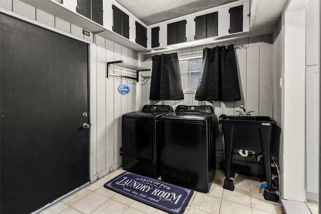 12727 Lefloss Ave, Norwalk, CA 90650 - washroom featuring washing machine and clothes dryer and tile patterned flooring