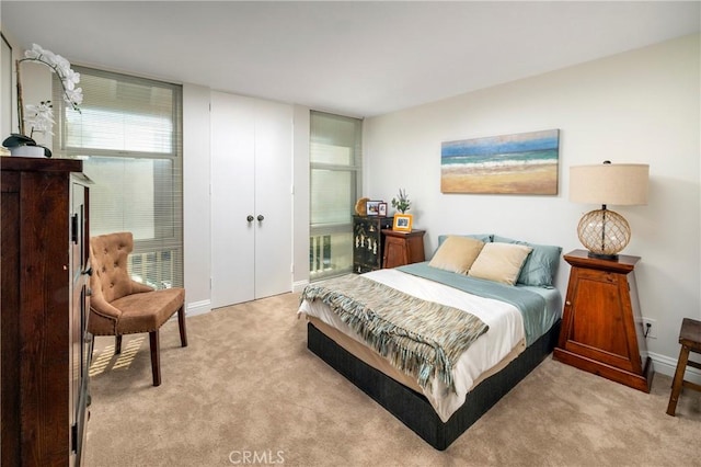 16520 Harbour Ln Unit 6, Huntington Beach, CA 92649 - bedroom featuring light colored carpet and baseboards