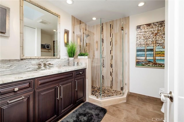 16520 Harbour Ln Unit 6, Huntington Beach, CA 92649 - full bath with vanity, a shower stall, tile patterned flooring, recessed lighting, and decorative backsplash