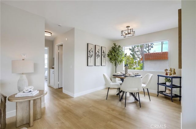 22701 Via Castilla, Lake Forest, CA 92630 - dining room featuring light wood finished floors and baseboards
