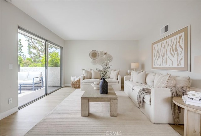 22701 Via Castilla, Lake Forest, CA 92630 - living room with light wood finished floors and baseboards