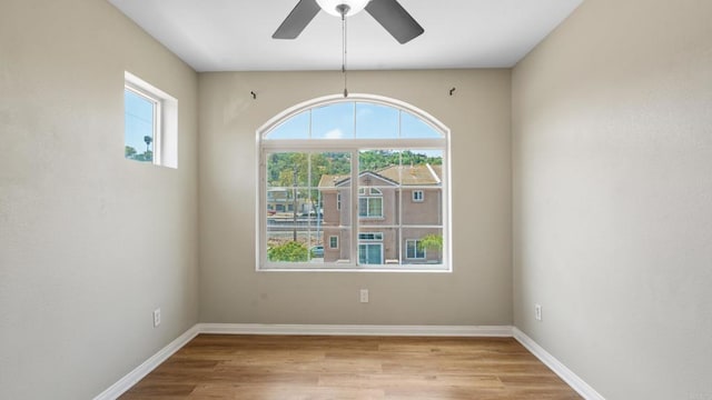 534 64th St, San Diego, CA 92114 - spare room featuring healthy amount of natural light, light wood-style floors, and a ceiling fan