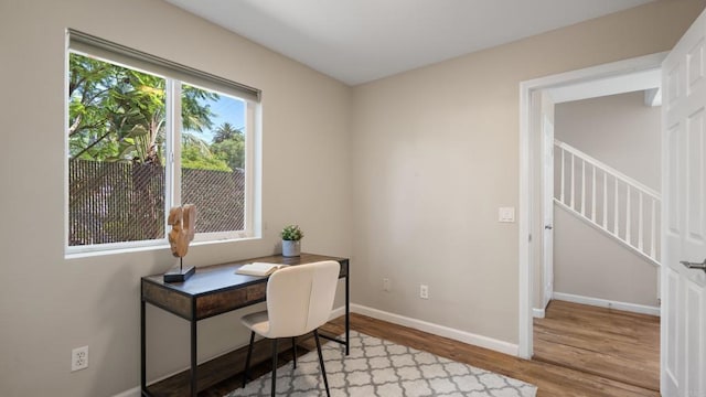 534 64th St, San Diego, CA 92114 - office featuring wood finished floors and baseboards