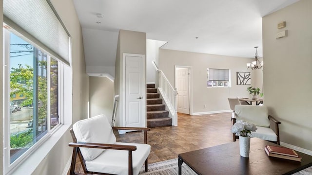 534 64th St, San Diego, CA 92114 - living room with stairway, healthy amount of natural light, and a chandelier