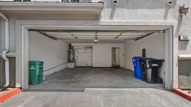 534 64th St, San Diego, CA 92114 - garage featuring strapped water heater