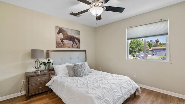 534 64th St, San Diego, CA 92114 - bedroom with wood finished floors and a ceiling fan