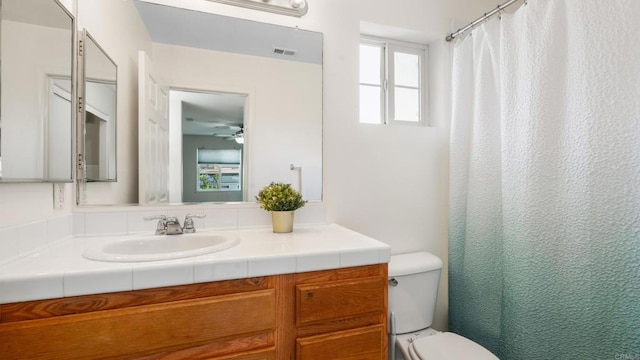534 64th St, San Diego, CA 92114 - bathroom with vanity, ceiling fan, and a shower with shower curtain