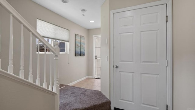 534 64th St, San Diego, CA 92114 - entryway featuring light carpet, light tile patterned flooring, stairs, and recessed lighting