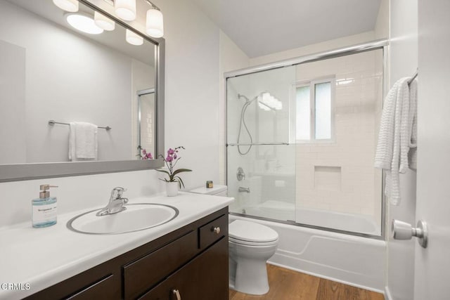 2247 Camilar Dr, Camarillo, CA 93010 - full bath with vanity, shower / bath combination with glass door, and wood finished floors