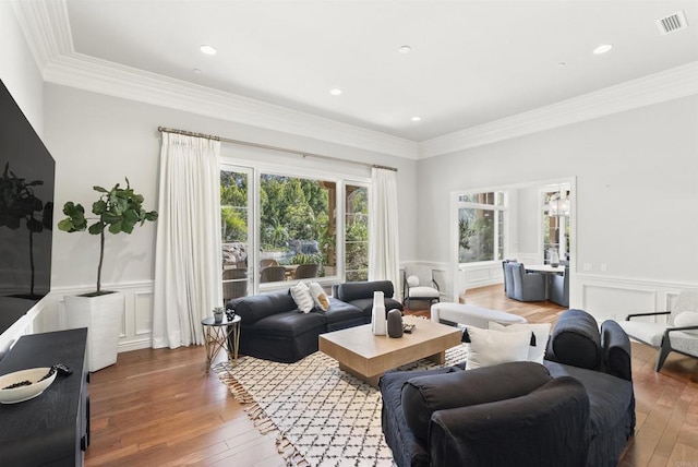 17324 Calle Serena, Rancho Santa Fe, CA 92067 - living room featuring a decorative wall, a wainscoted wall, crown molding, and hardwood / wood-style flooring