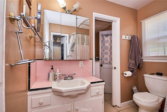 900 S Los Robles Ave, Pasadena, CA 91106 - full bath with vanity, decorative backsplash, and tile patterned flooring