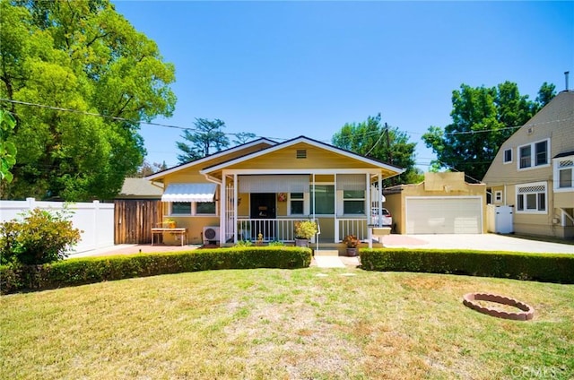 900 S Los Robles Ave, Pasadena, CA 91106 - view of front facade with covered porch, concrete driveway, an outbuilding, and a garage