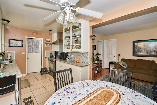 900 S Los Robles Ave, Pasadena, CA 91106 - dining area with a ceiling fan and light tile patterned floors