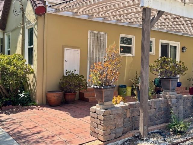 900 S Los Robles Ave, Pasadena, CA 91106 - view of patio featuring a pergola